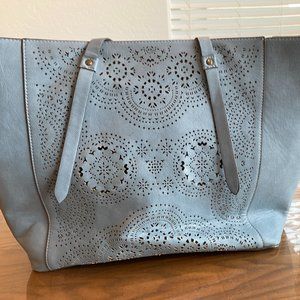 Laser cut reversible tote bag